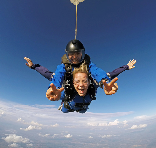 two people enjoying skydiving