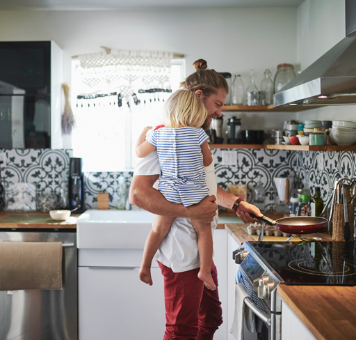 Father cooking in kitchen