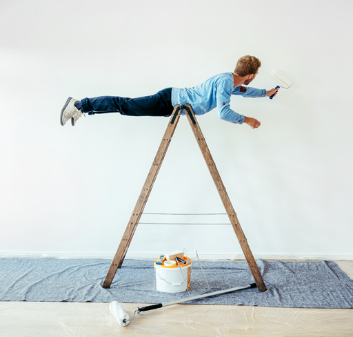 man painting on walls