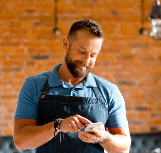 Man smiling with phone