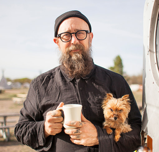Man outdoors with dog