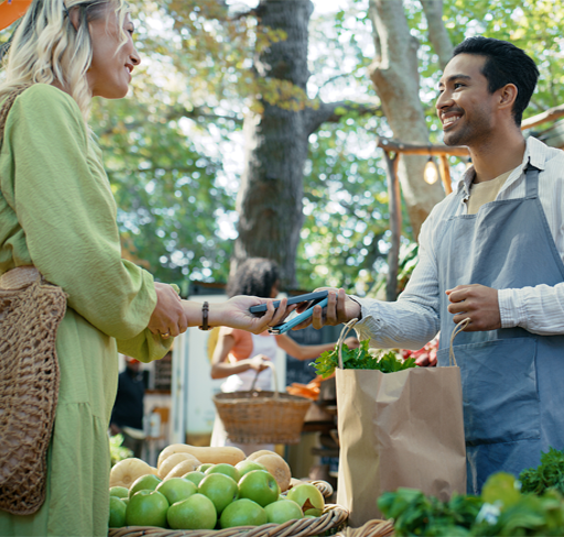 Women purchasing in market
