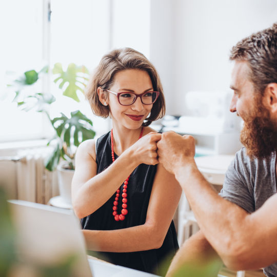Person relaxing on an inflatable ring in water