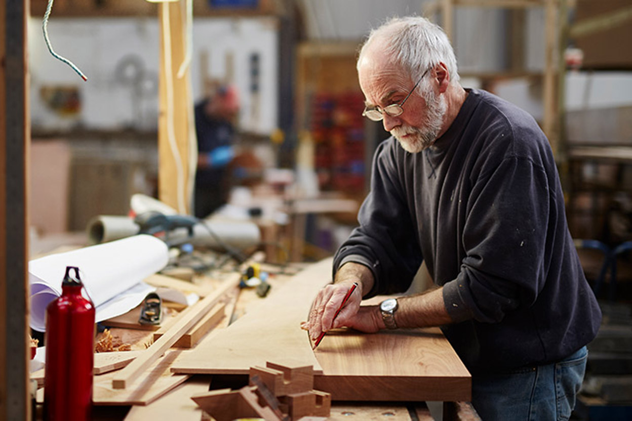 old man carpenting