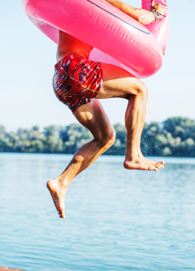 Person jumping with floatie