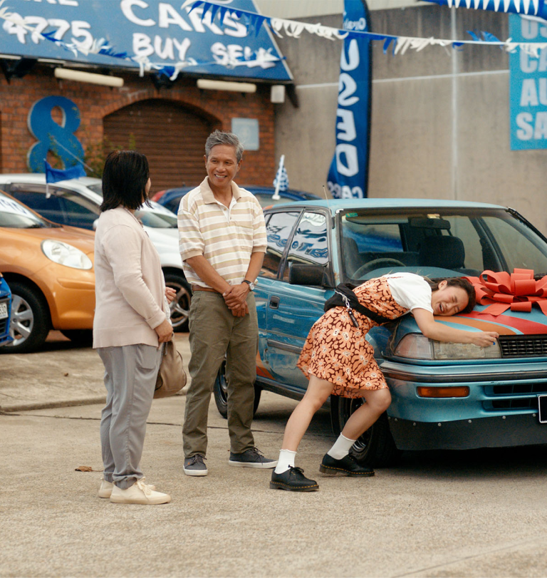 Girl hugging car